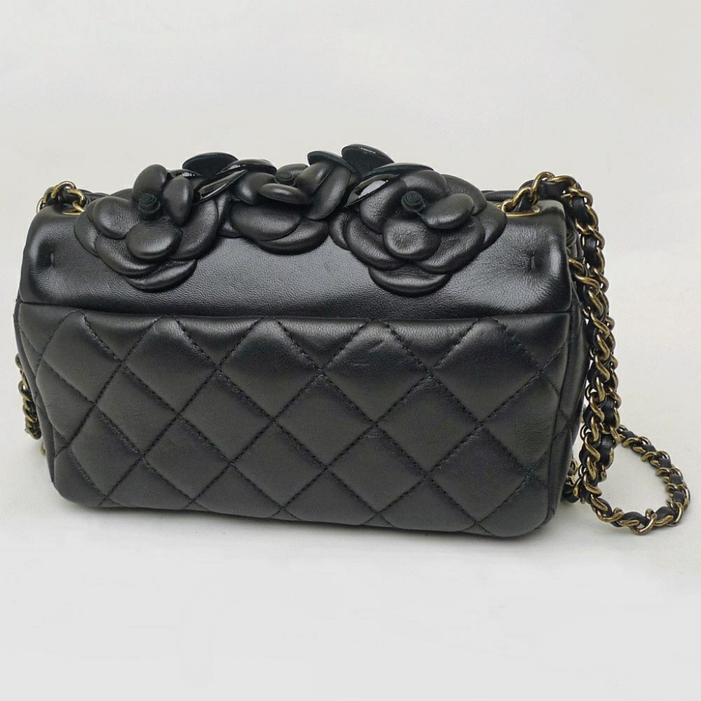The CHANEL Camellia Black Leather Flap Bag - Picture 9 of 10